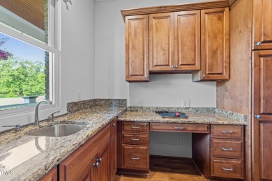 This 4 bedroom, 4 and a half-bath home offers over 170 feet of on TPC at Wakefield Plantation in North Carolina - for sale on GolfHomes.com, golf home, golf lot