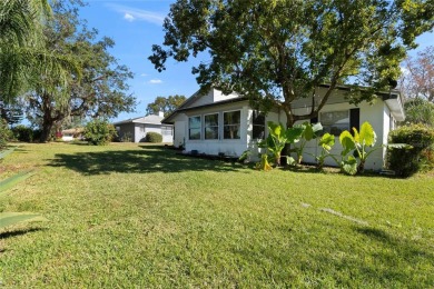 Discover your peaceful retreat in this charming two-bedroom on Sun Air Golf Course in Florida - for sale on GolfHomes.com, golf home, golf lot