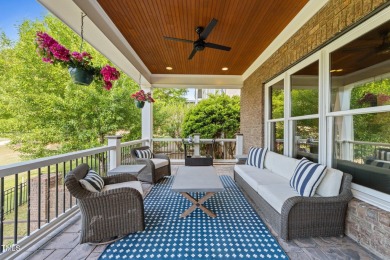 This 4 bedroom, 4 and a half-bath home offers over 170 feet of on TPC at Wakefield Plantation in North Carolina - for sale on GolfHomes.com, golf home, golf lot