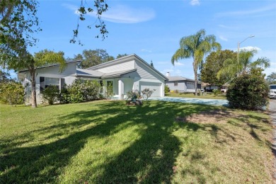 Discover your peaceful retreat in this charming two-bedroom on Sun Air Golf Course in Florida - for sale on GolfHomes.com, golf home, golf lot