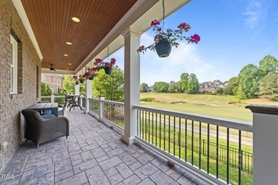 This 4 bedroom, 4 and a half-bath home offers over 170 feet of on TPC at Wakefield Plantation in North Carolina - for sale on GolfHomes.com, golf home, golf lot