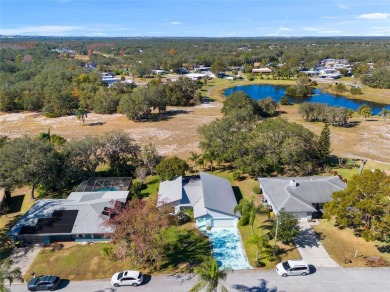 Discover your peaceful retreat in this charming two-bedroom on Sun Air Golf Course in Florida - for sale on GolfHomes.com, golf home, golf lot