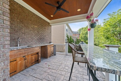 This 4 bedroom, 4 and a half-bath home offers over 170 feet of on TPC at Wakefield Plantation in North Carolina - for sale on GolfHomes.com, golf home, golf lot