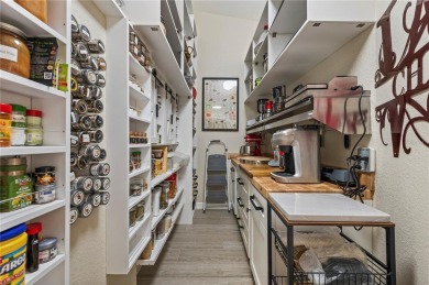 Some homes have rooms. This one has destinations-a kitchen built on Deep Creek Golf Club in Florida - for sale on GolfHomes.com, golf home, golf lot