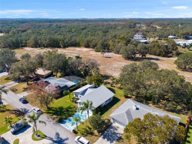 Discover your peaceful retreat in this charming two-bedroom on Sun Air Golf Course in Florida - for sale on GolfHomes.com, golf home, golf lot