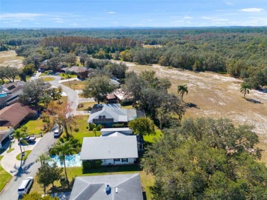 Discover your peaceful retreat in this charming two-bedroom on Sun Air Golf Course in Florida - for sale on GolfHomes.com, golf home, golf lot