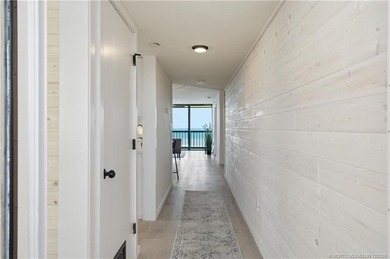 Wake up each day to sweeping, unobstructed coastline views in a on Island Dunes Country Club in Florida - for sale on GolfHomes.com, golf home, golf lot