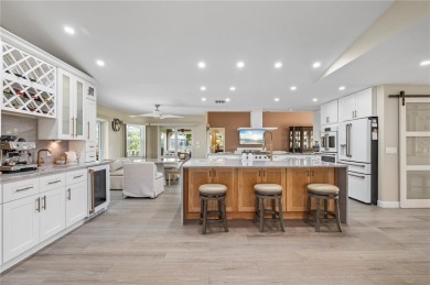 Some homes have rooms. This one has destinations-a kitchen built on Deep Creek Golf Club in Florida - for sale on GolfHomes.com, golf home, golf lot