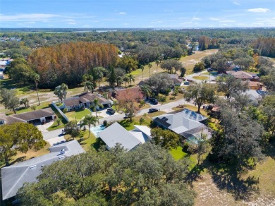 Discover your peaceful retreat in this charming two-bedroom on Sun Air Golf Course in Florida - for sale on GolfHomes.com, golf home, golf lot