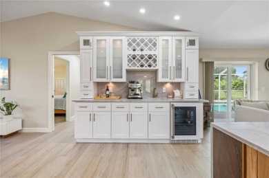 Some homes have rooms. This one has destinations-a kitchen built on Deep Creek Golf Club in Florida - for sale on GolfHomes.com, golf home, golf lot