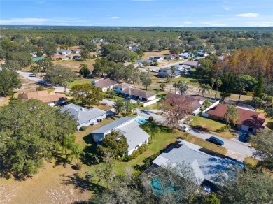 Discover your peaceful retreat in this charming two-bedroom on Sun Air Golf Course in Florida - for sale on GolfHomes.com, golf home, golf lot