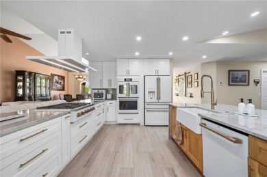 Some homes have rooms. This one has destinations-a kitchen built on Deep Creek Golf Club in Florida - for sale on GolfHomes.com, golf home, golf lot