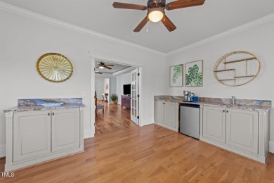 This 4 bedroom, 4 and a half-bath home offers over 170 feet of on TPC at Wakefield Plantation in North Carolina - for sale on GolfHomes.com, golf home, golf lot