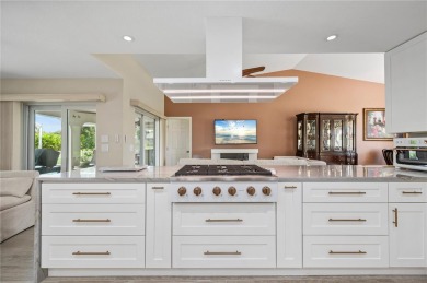 Some homes have rooms. This one has destinations-a kitchen built on Deep Creek Golf Club in Florida - for sale on GolfHomes.com, golf home, golf lot