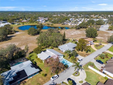 Discover your peaceful retreat in this charming two-bedroom on Sun Air Golf Course in Florida - for sale on GolfHomes.com, golf home, golf lot