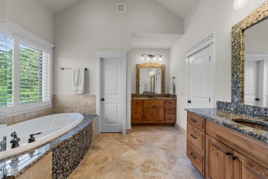 This 4 bedroom, 4 and a half-bath home offers over 170 feet of on TPC at Wakefield Plantation in North Carolina - for sale on GolfHomes.com, golf home, golf lot