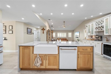 Some homes have rooms. This one has destinations-a kitchen built on Deep Creek Golf Club in Florida - for sale on GolfHomes.com, golf home, golf lot