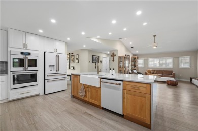 Some homes have rooms. This one has destinations-a kitchen built on Deep Creek Golf Club in Florida - for sale on GolfHomes.com, golf home, golf lot