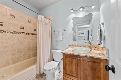 This 4 bedroom, 4 and a half-bath home offers over 170 feet of on TPC at Wakefield Plantation in North Carolina - for sale on GolfHomes.com, golf home, golf lot