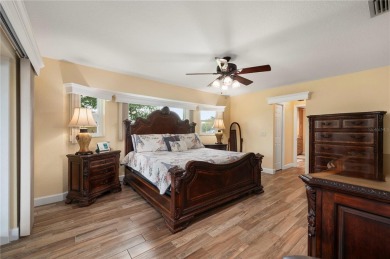Some homes have rooms. This one has destinations-a kitchen built on Deep Creek Golf Club in Florida - for sale on GolfHomes.com, golf home, golf lot