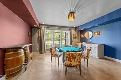 This 4 bedroom, 4 and a half-bath home offers over 170 feet of on TPC at Wakefield Plantation in North Carolina - for sale on GolfHomes.com, golf home, golf lot