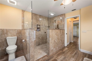 Some homes have rooms. This one has destinations-a kitchen built on Deep Creek Golf Club in Florida - for sale on GolfHomes.com, golf home, golf lot