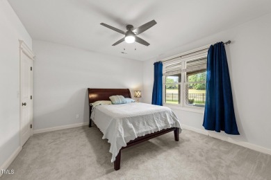 This 4 bedroom, 4 and a half-bath home offers over 170 feet of on TPC at Wakefield Plantation in North Carolina - for sale on GolfHomes.com, golf home, golf lot