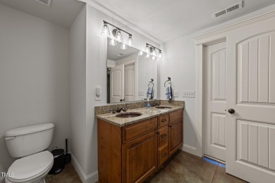 This 4 bedroom, 4 and a half-bath home offers over 170 feet of on TPC at Wakefield Plantation in North Carolina - for sale on GolfHomes.com, golf home, golf lot