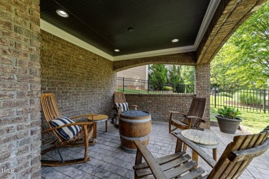 This 4 bedroom, 4 and a half-bath home offers over 170 feet of on TPC at Wakefield Plantation in North Carolina - for sale on GolfHomes.com, golf home, golf lot