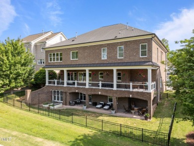 This 4 bedroom, 4 and a half-bath home offers over 170 feet of on TPC at Wakefield Plantation in North Carolina - for sale on GolfHomes.com, golf home, golf lot