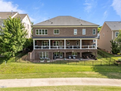 This 4 bedroom, 4 and a half-bath home offers over 170 feet of on TPC at Wakefield Plantation in North Carolina - for sale on GolfHomes.com, golf home, golf lot