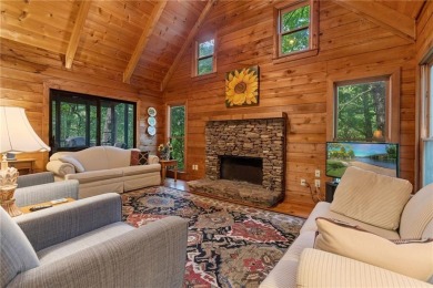 Discover the perfect mountain escape in this charming 3-bedroom on Big Canoe Golf Club - Cherokee in Georgia - for sale on GolfHomes.com, golf home, golf lot