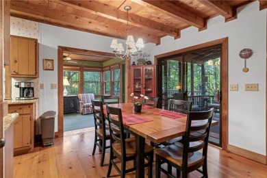 Discover the perfect mountain escape in this charming 3-bedroom on Big Canoe Golf Club - Cherokee in Georgia - for sale on GolfHomes.com, golf home, golf lot
