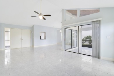 Welcome home to 5695 Lakeview Mews Drive in the heart of Boynton on Indian Spring Golf and Country Club in Florida - for sale on GolfHomes.com, golf home, golf lot