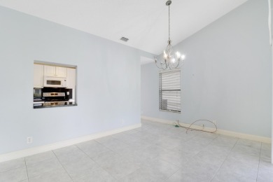 Welcome home to 5695 Lakeview Mews Drive in the heart of Boynton on Indian Spring Golf and Country Club in Florida - for sale on GolfHomes.com, golf home, golf lot