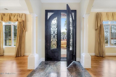 Majestic and meticulously crafted, this exceptional residence in on Wedgewood Golfers Club in Mississippi - for sale on GolfHomes.com, golf home, golf lot