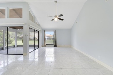 Welcome home to 5695 Lakeview Mews Drive in the heart of Boynton on Indian Spring Golf and Country Club in Florida - for sale on GolfHomes.com, golf home, golf lot