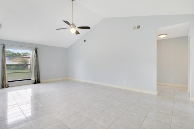 Welcome home to 5695 Lakeview Mews Drive in the heart of Boynton on Indian Spring Golf and Country Club in Florida - for sale on GolfHomes.com, golf home, golf lot