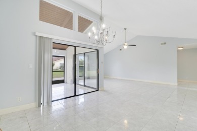 Welcome home to 5695 Lakeview Mews Drive in the heart of Boynton on Indian Spring Golf and Country Club in Florida - for sale on GolfHomes.com, golf home, golf lot