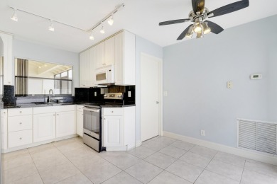 Welcome home to 5695 Lakeview Mews Drive in the heart of Boynton on Indian Spring Golf and Country Club in Florida - for sale on GolfHomes.com, golf home, golf lot