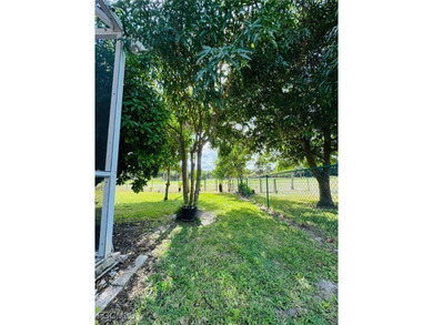 Absolutely beautiful and unique property! No HOA, but connected on Lehigh Resort Club in Florida - for sale on GolfHomes.com, golf home, golf lot