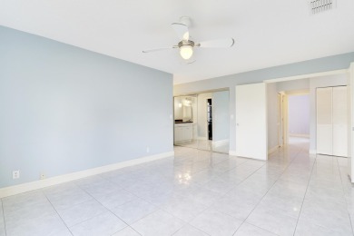Welcome home to 5695 Lakeview Mews Drive in the heart of Boynton on Indian Spring Golf and Country Club in Florida - for sale on GolfHomes.com, golf home, golf lot