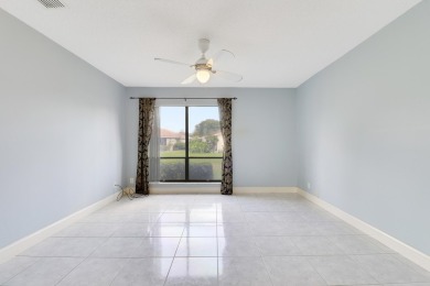 Welcome home to 5695 Lakeview Mews Drive in the heart of Boynton on Indian Spring Golf and Country Club in Florida - for sale on GolfHomes.com, golf home, golf lot