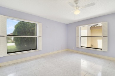 Welcome home to 5695 Lakeview Mews Drive in the heart of Boynton on Indian Spring Golf and Country Club in Florida - for sale on GolfHomes.com, golf home, golf lot