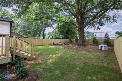 Step into this absolutely stunning, fully renovated home in the on East Lake Golf Club in Georgia - for sale on GolfHomes.com, golf home, golf lot