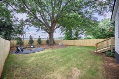 Step into this absolutely stunning, fully renovated home in the on East Lake Golf Club in Georgia - for sale on GolfHomes.com, golf home, golf lot