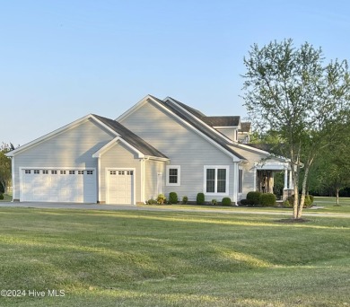 This beautiful 3-bedroom, 2.5-bath home is located in The on Sound Golf Links at Albemarle Plantation in North Carolina - for sale on GolfHomes.com, golf home, golf lot