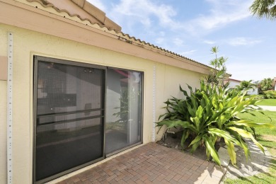 Welcome home to 5695 Lakeview Mews Drive in the heart of Boynton on Indian Spring Golf and Country Club in Florida - for sale on GolfHomes.com, golf home, golf lot