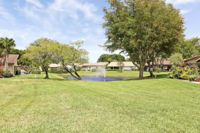 Welcome home to 5695 Lakeview Mews Drive in the heart of Boynton on Indian Spring Golf and Country Club in Florida - for sale on GolfHomes.com, golf home, golf lot