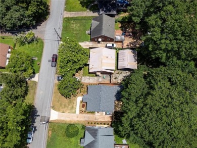 Step into this absolutely stunning, fully renovated home in the on East Lake Golf Club in Georgia - for sale on GolfHomes.com, golf home, golf lot